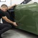 Technician Applying Custom Vehicle Wrap